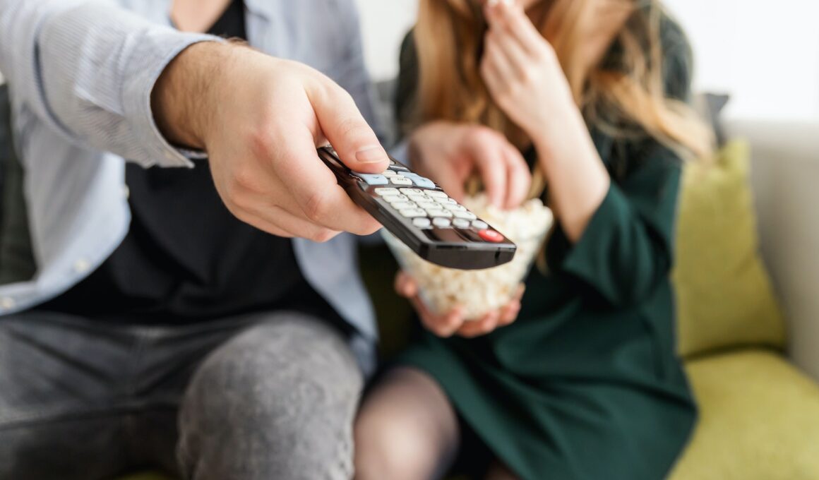 Man Holding Remote Control