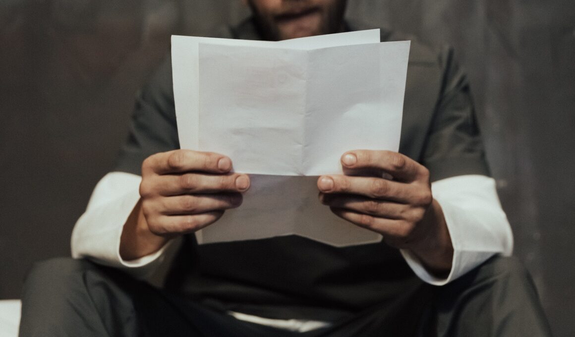 A Prisoner Reading a Letter