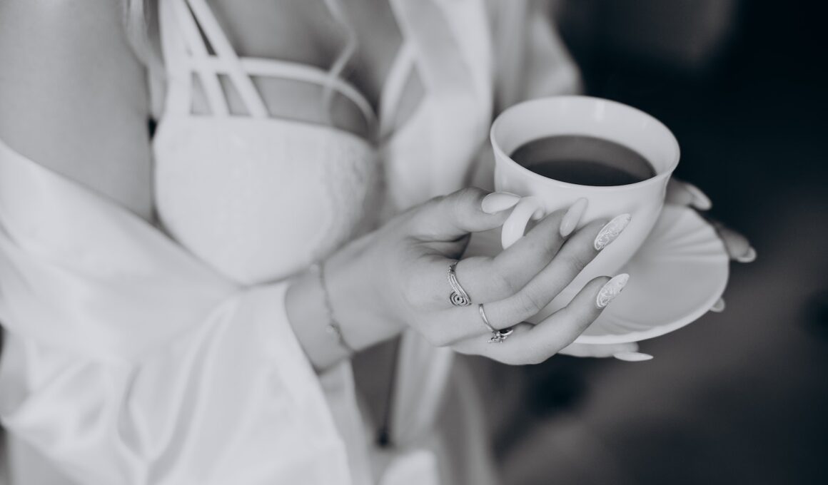 Hands Holding Cup with Drink