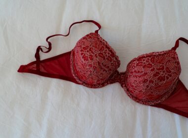 Red Brassiere on White Textile