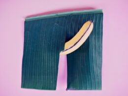 Yellow Banana on Purple Background