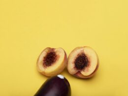 Sliced Peach on Yellow Surface