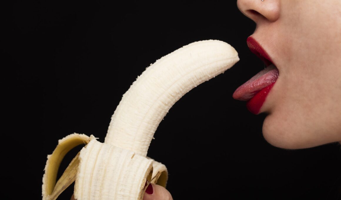 Peeled Banana near a Woman's Mouth