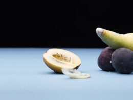 Sliced Lemon and Green Fruit