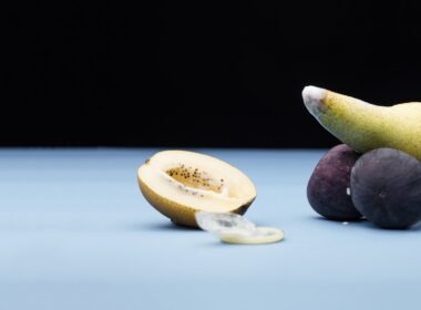 Sliced Lemon and Green Fruit