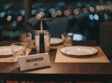 white ceramic plate on brown wooden table