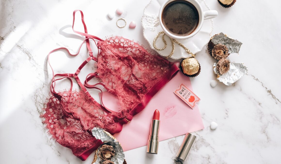 Red Brassiere Beside Black Coffee on Marble Surface