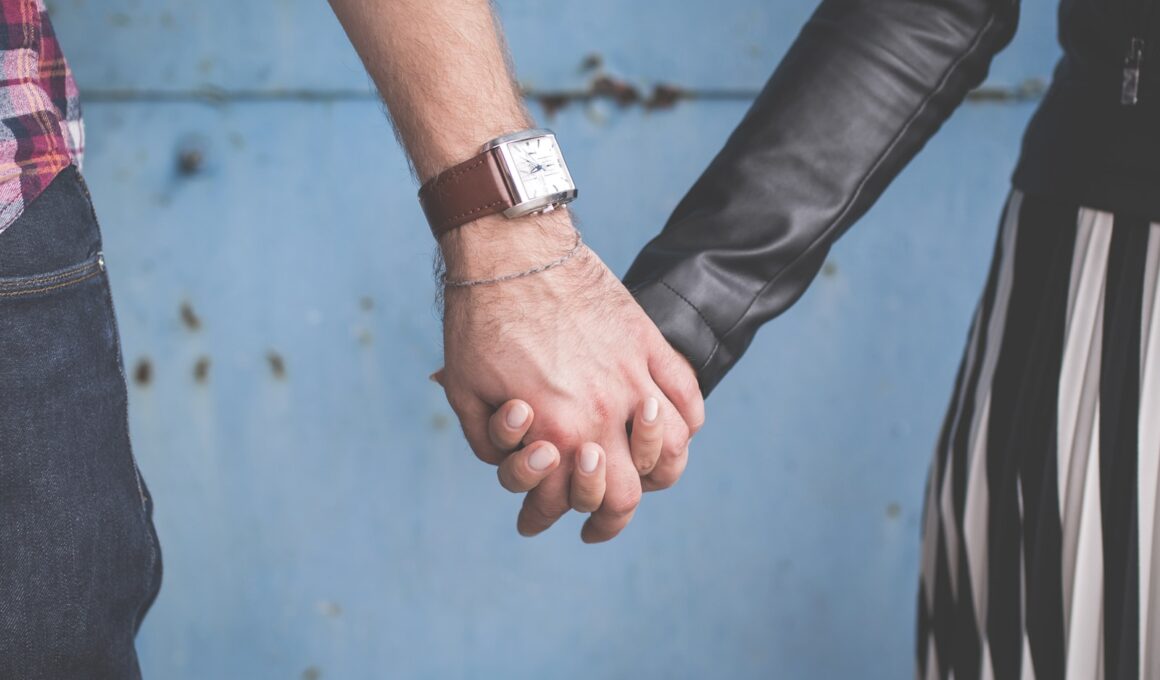 man and woman holding hands