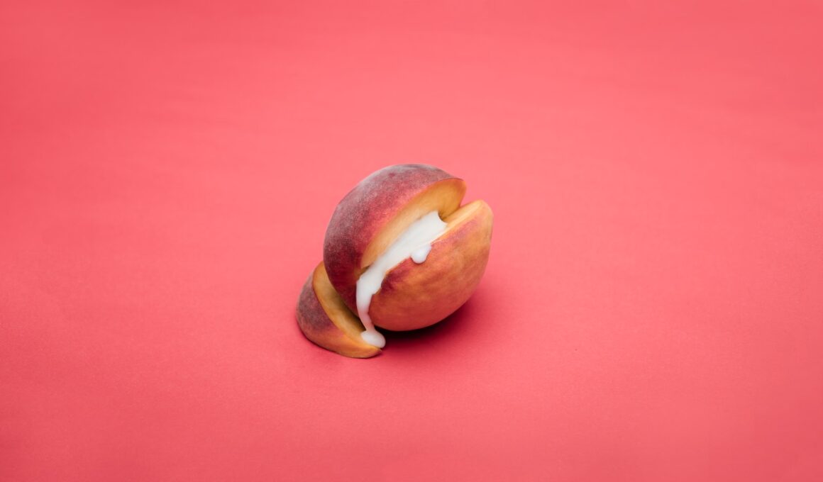 sliced apple fruit on pink surface