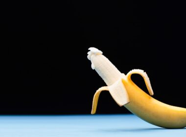 yellow banana fruit on black surface