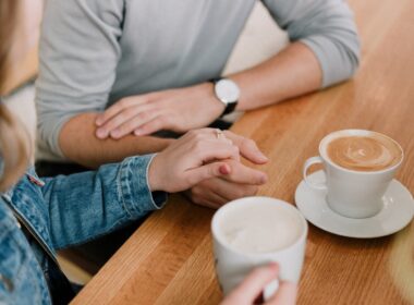 man and woman holding hands