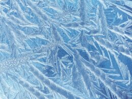 a close up of ice crystals on a window