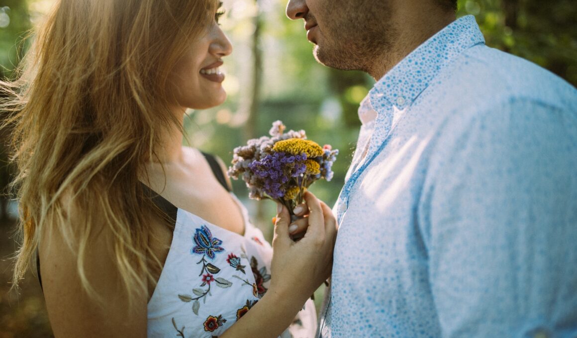 man and woman facing each other while holding flowers