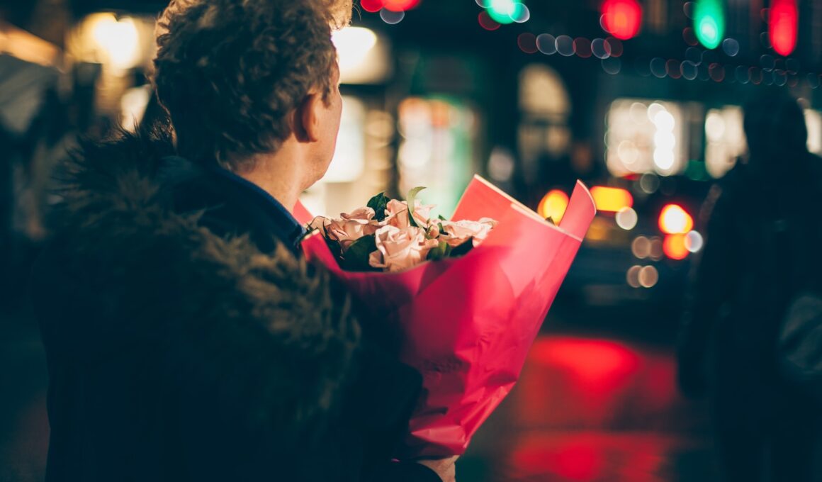 man in black faux fur coat holding bouquet of floweers