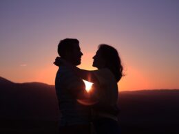 silhouette of hugging couple