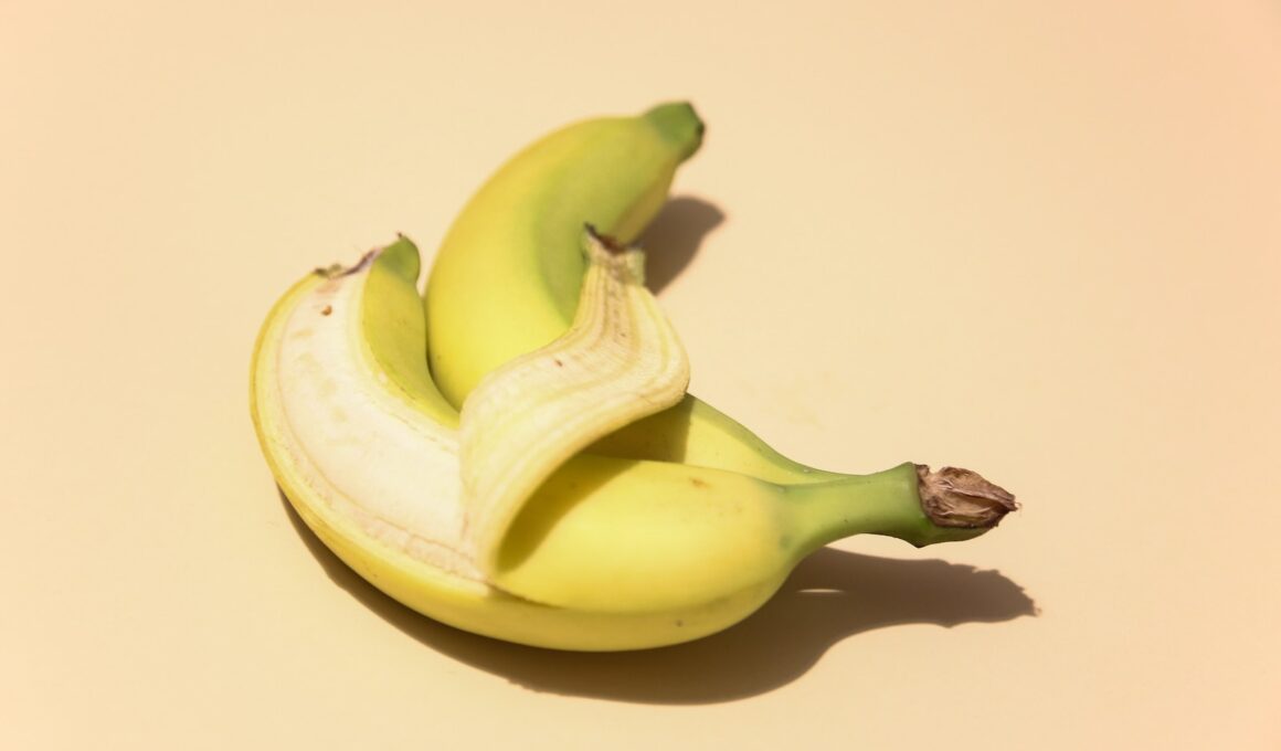 yellow banana fruit on white surface