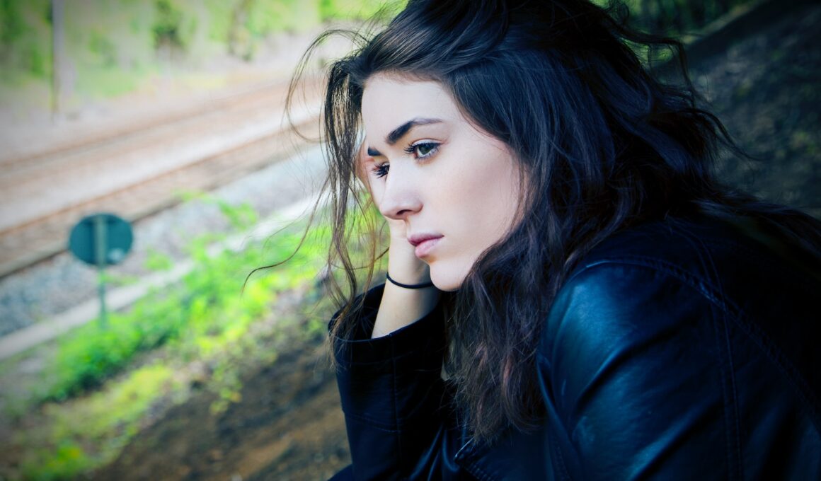 woman sitting outdoor during daytime