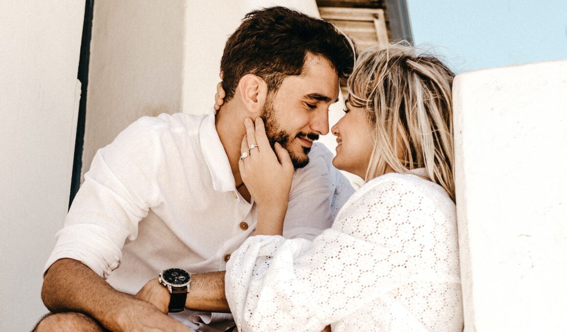 smiling man and woman about to kiss