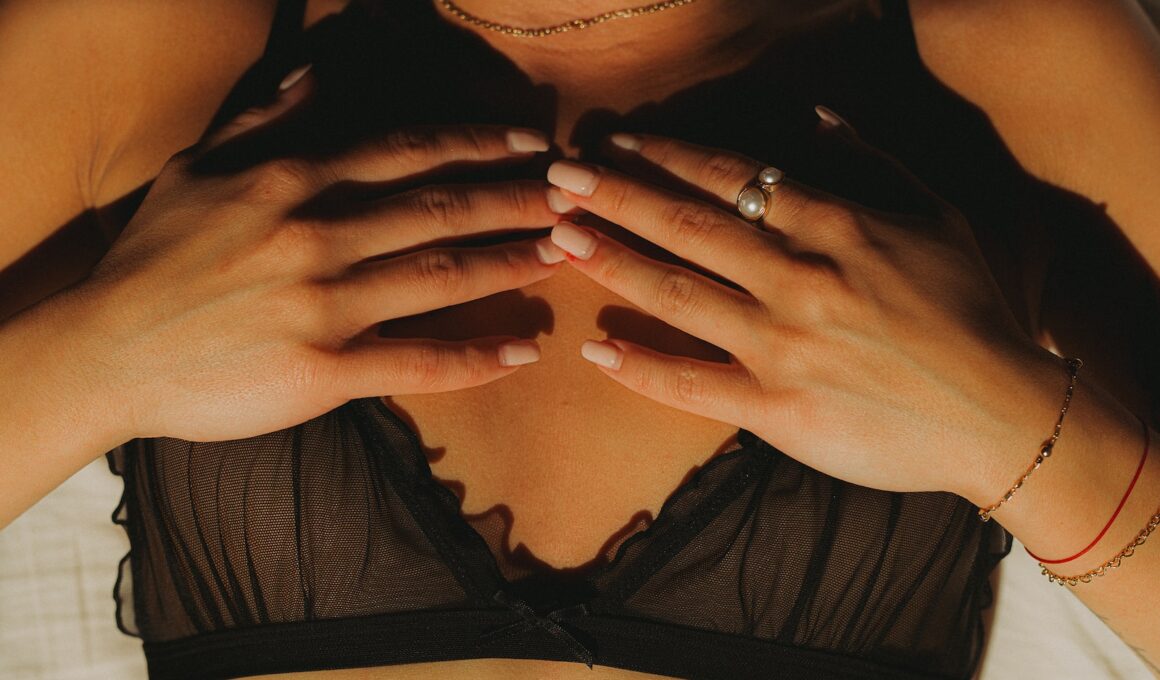 woman in black tank top wearing silver ring