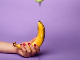 yellow banana fruit on persons hand